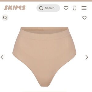 Skims Seamless Sculpt Mid Waist Thong in color Mica